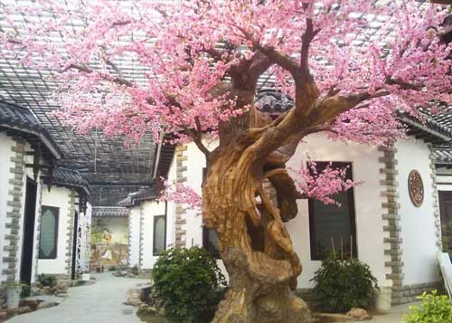 沈陽仿真樹批發(fā),桃花樹制作,水泥大樹施工,綠植軟裝配套-沈陽綠飾界景觀工程有限公司